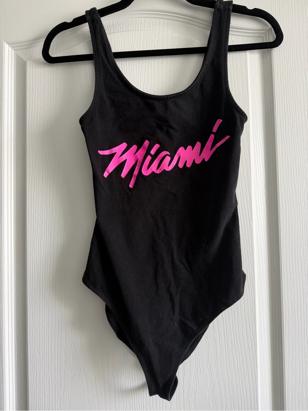 Miami Heat NBA Women’s Black Bodysuit with Pink "Miami" Script